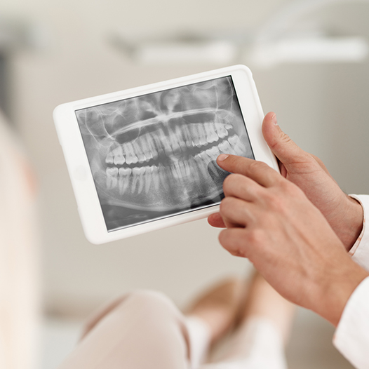 Dentist using advanced technology