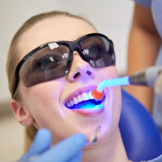 Patient receiving cosmetic dental bonding