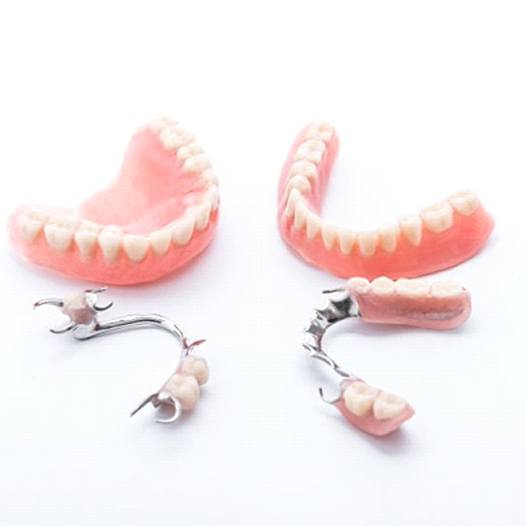 two full dentures and two partials