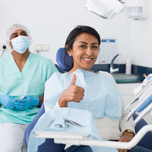 smiling woman who was a good candidate for KöR teeth whitening in Pensacola