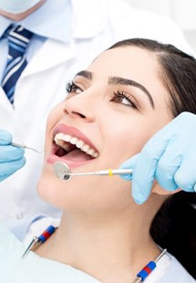 patient getting dental checkup 