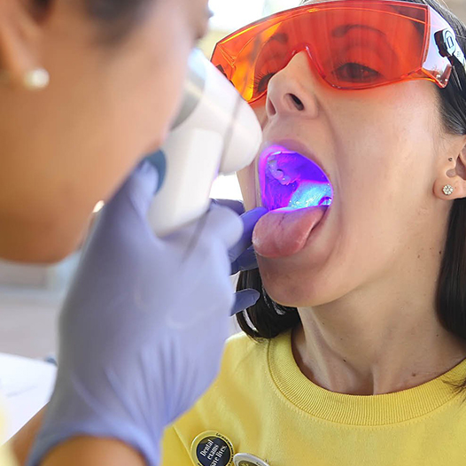 Closeup of patient's smile during oral cancer screening