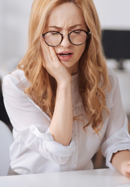 Woman suffering from toothache