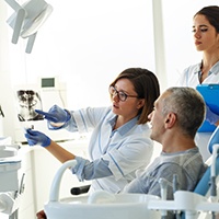  Patient in Pensacola talking to dentist about root canals