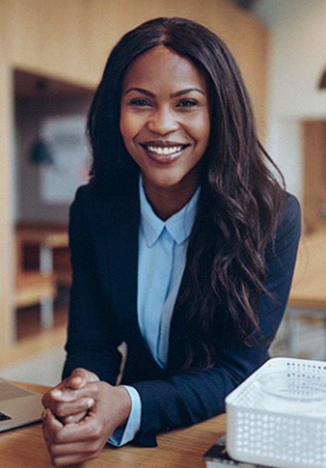 Businesswoman smiling with veneers in Pensacola