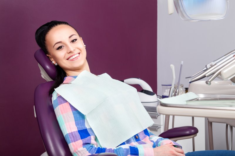 Woman smiling at dentist