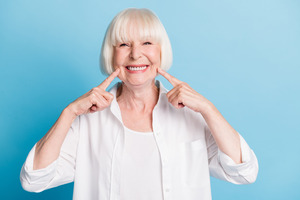 Someone with dentures smiling